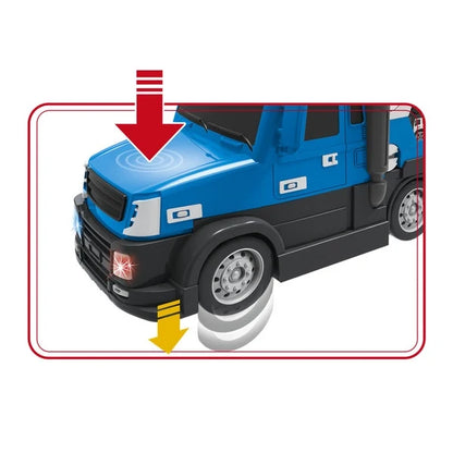Close-up of blue police truck toy front and wheels, with glowing light effects.
