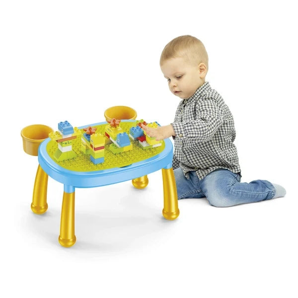 2-in-1 activity table with blocks; toddler seated and playing at the round top