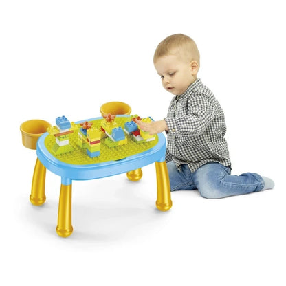 2-in-1 activity table with blocks; toddler seated and playing at the round top