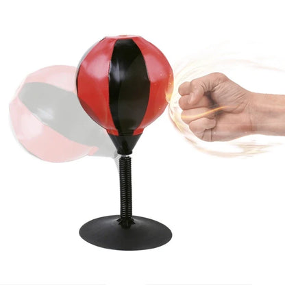 Table punching ball red and black ball with black spring stem and round base