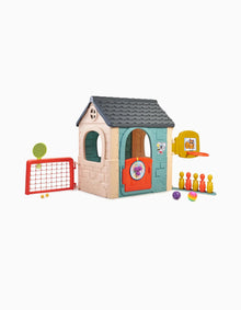 Ecological Activity House playhouse with teal door, arched windows, and play accessories