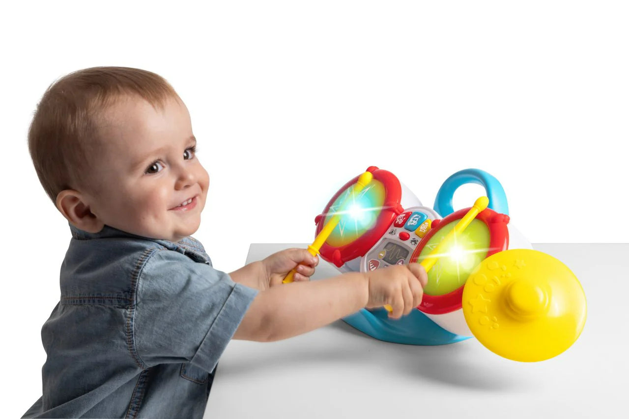 My First Drum Kit toy drum set being played by a child
