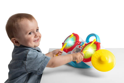 My First Drum Kit toy drum set being played by a child