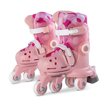 Pink Twista roller skates with adjustable straps and quad wheels