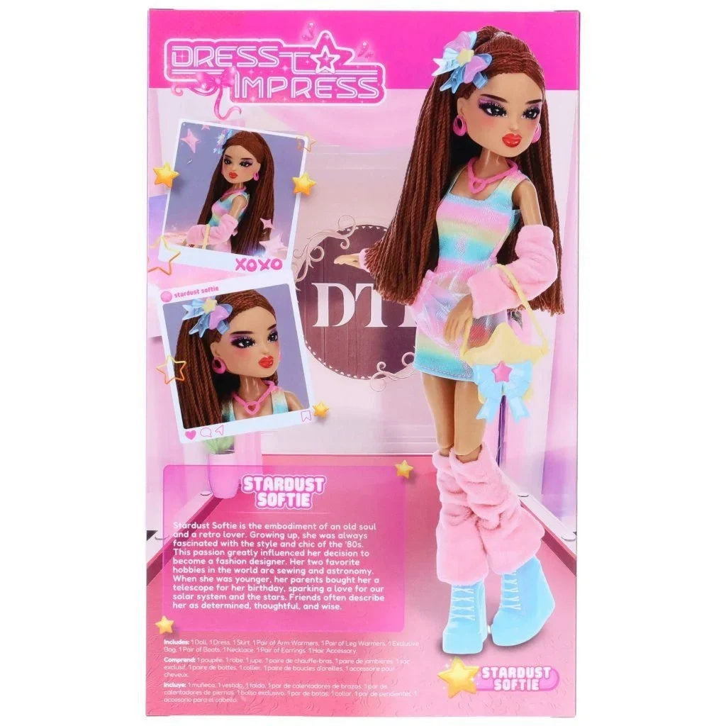 Pastel pink and light blue fashion doll with long brown hair in star-themed outfit