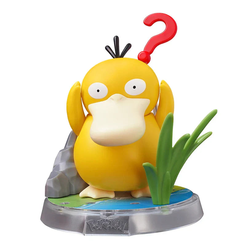 Psyduck figure with red question mark, blue base and gray rock accents