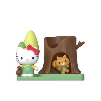 Hello Kitty and small character beside brown tree stump playset base