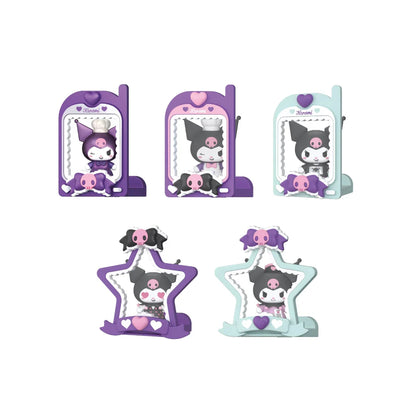 Set of Magical Kuromi figures with purple and mint bases, shown in window boxes