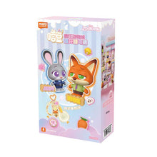 Toy collectible buddy emblem box with bunny and cat character artwork