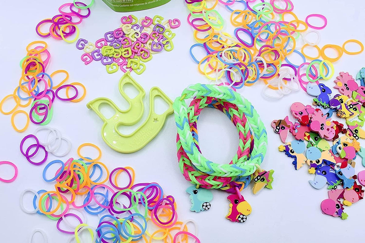 Loomi-Pals dinosaur collectible charm with braided rainbow rubber bands and clip