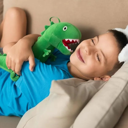 Child holding plush blind ball toys: pink pig, yellow fish, green dino