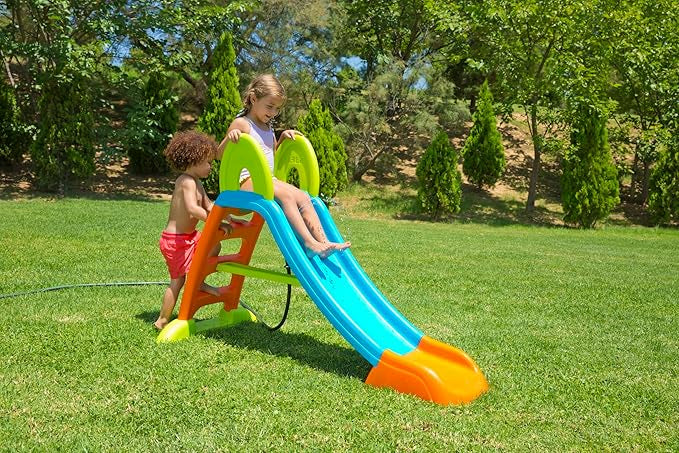 Outdoor water slide with blue chute, orange end, green steps on frame