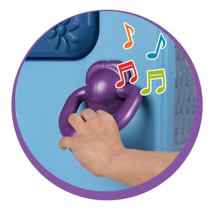 Purple handle on blue castle playhouse with musical note icons