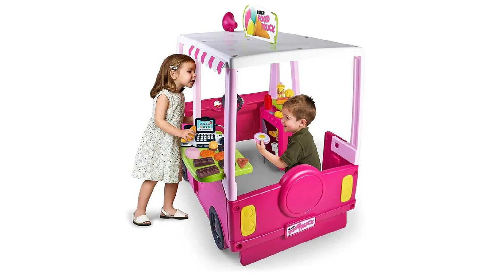 Pink toy food truck playhouse with kids using the front window and play kitchen panel