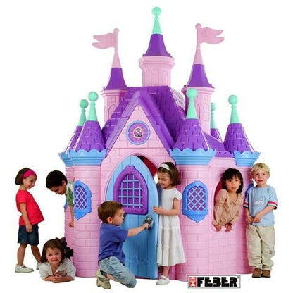 Pink toy palace castle with purple roof, blue windows, green turrets, and front door