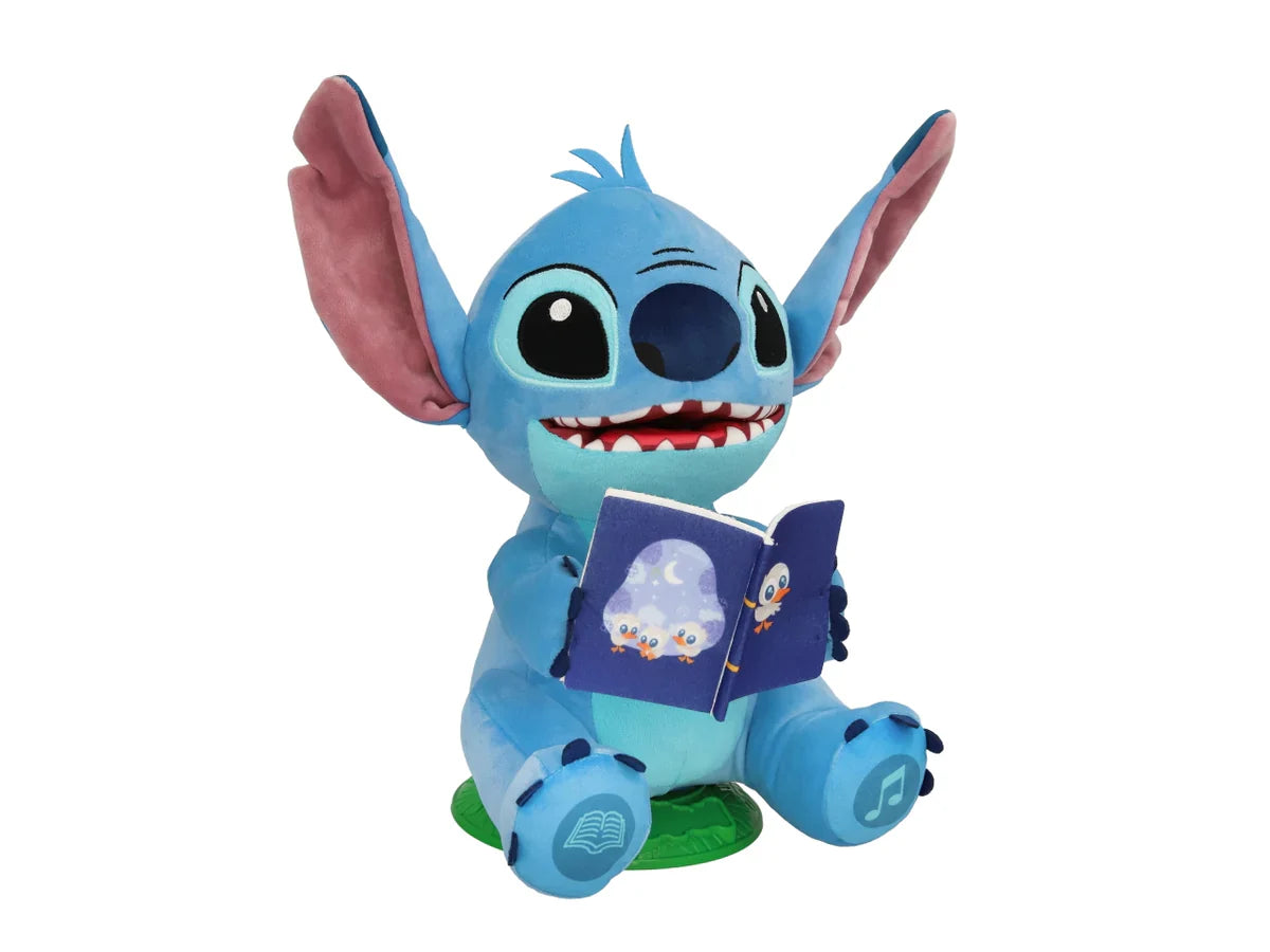 Peluche Stitch interactivo azul con libro abierto y orejas rosas