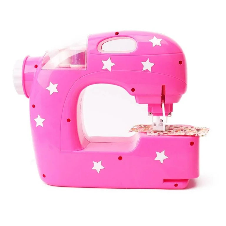 Pink Barbie sewing machine with star pattern, curved body, clear bobbin window, cutting mat