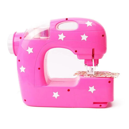 Pink Barbie sewing machine with star pattern, curved body, clear bobbin window, cutting mat