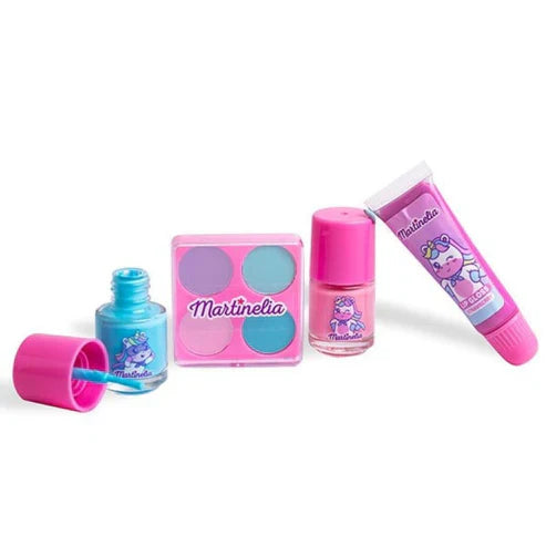 Mini makeup set: pink palette, blue bottle, lip balm tube and matching gloss