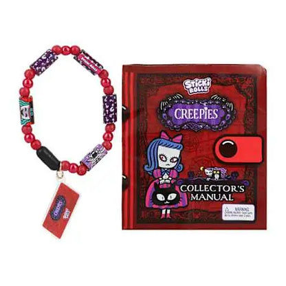 Creepies Mystery Capsule: rotes Perlenarmband und Collectors Manual
