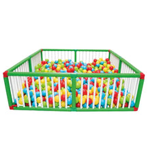Kids ball pool with green frame, white mesh sides, and colorful plastic balls inside