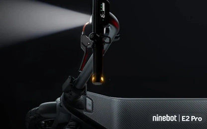 Ninebot E2 Pro electric scooter front with illuminated light near handlebars