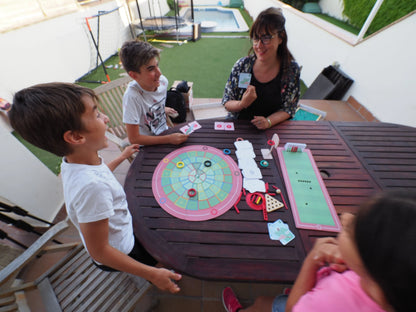 Olymplakks neuron game on table with spinning wheel and instruction cards