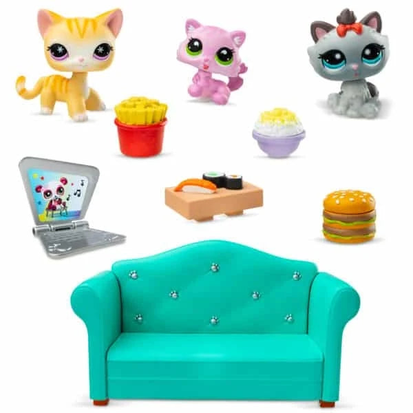 Diner Dash play set with teal sofa, three animal figures, and laptop and food accessories
