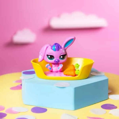 Purple bunny toy sitting in yellow pet bowl on blue base with carrot accessory
