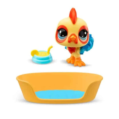 Orange chick toy standing in yellow pet bowl with blue sand pail accessory