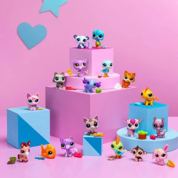Pet surprise toy figures on pastel stackable cubes, featuring multiple animal characters