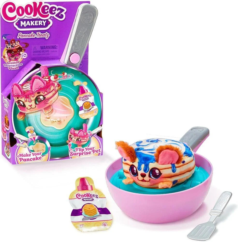 Pancake Treatz play set with pink bowl, toy pancake, and gray spatula pieces