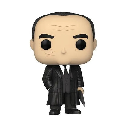 Collectible Oswald Cobblepot figure in black coat and suit with white shirt