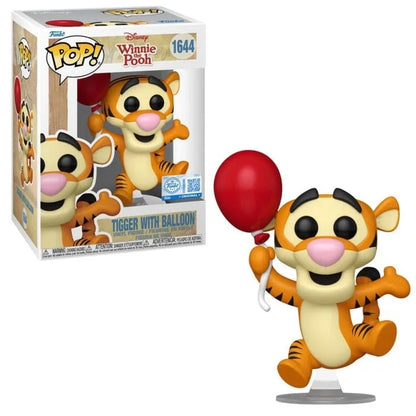 Tigger collectible figure with red balloon, shown with original product box