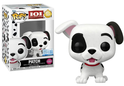 Flocked white puppy figurine with black ears, red collar, and tongue-out smile.