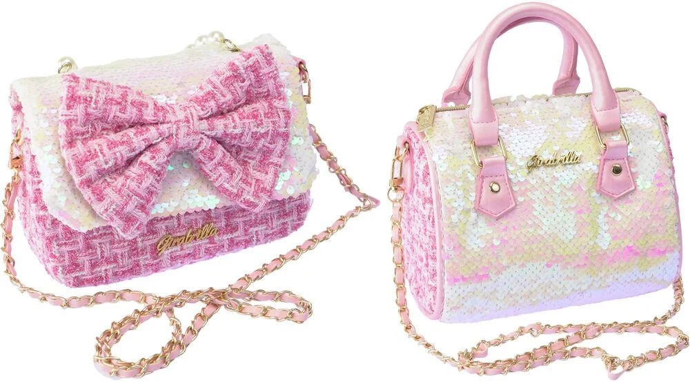 Pink and white bow-front handbag toy with top handles and gold chain strap