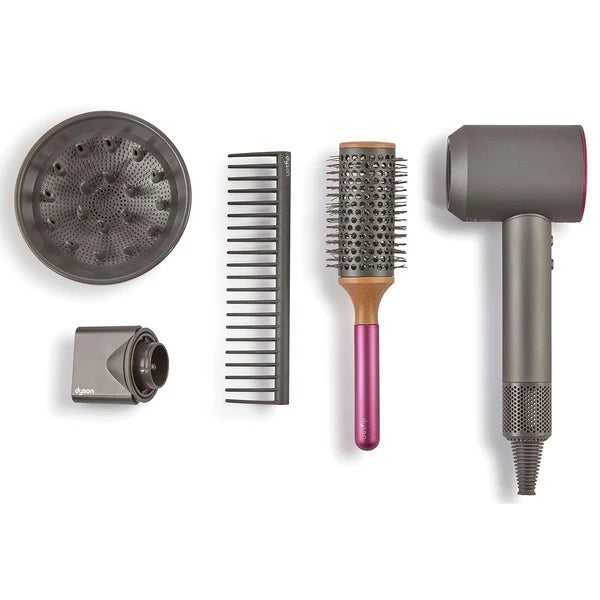 Dyson Beau pretend play hairdryer set with brushes, comb, and nozzles