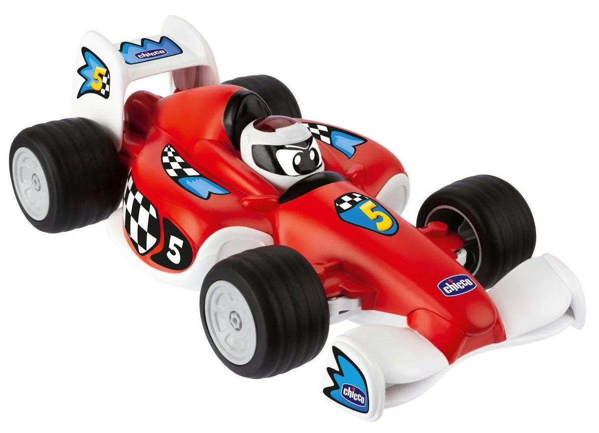 Red toy remote racing car with black tires and white rear wing