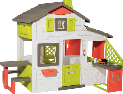 Toy playhouse set with multicolor doors, windows, and slide