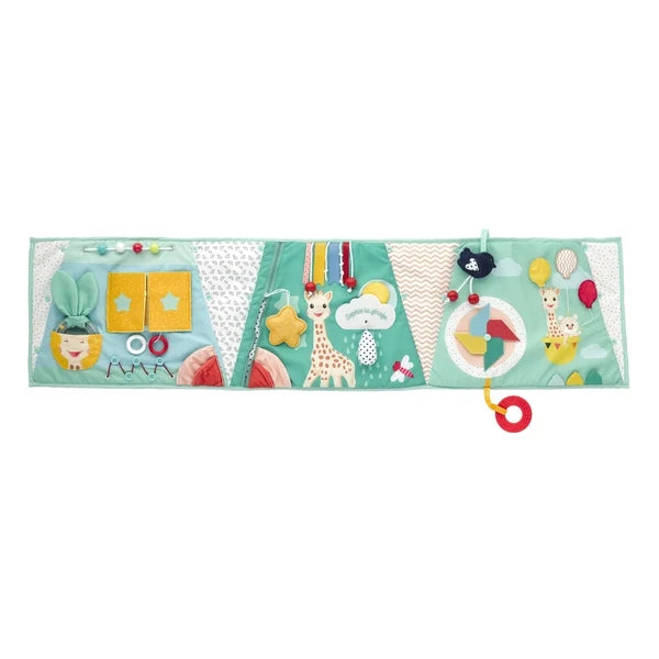 Fabric activity board playmat with sewn panels and dangling toys, colorful animal designs