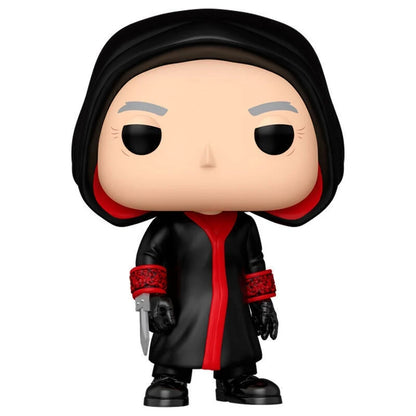 Jigsaw vinyl figure in black coat with red trim and hood, holding a tool