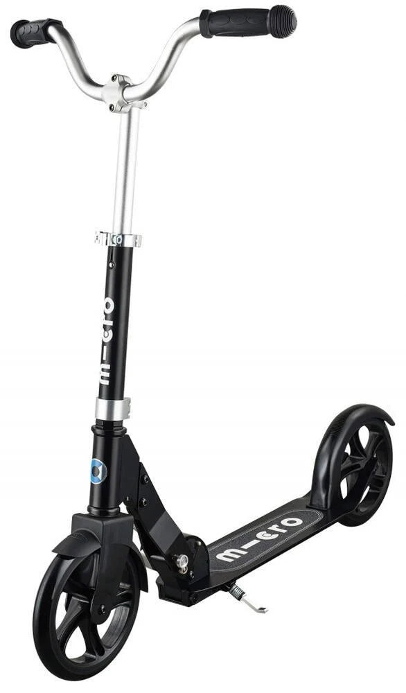 Black Micro cruiser scooter with handlebar grips, stem, and two wheels