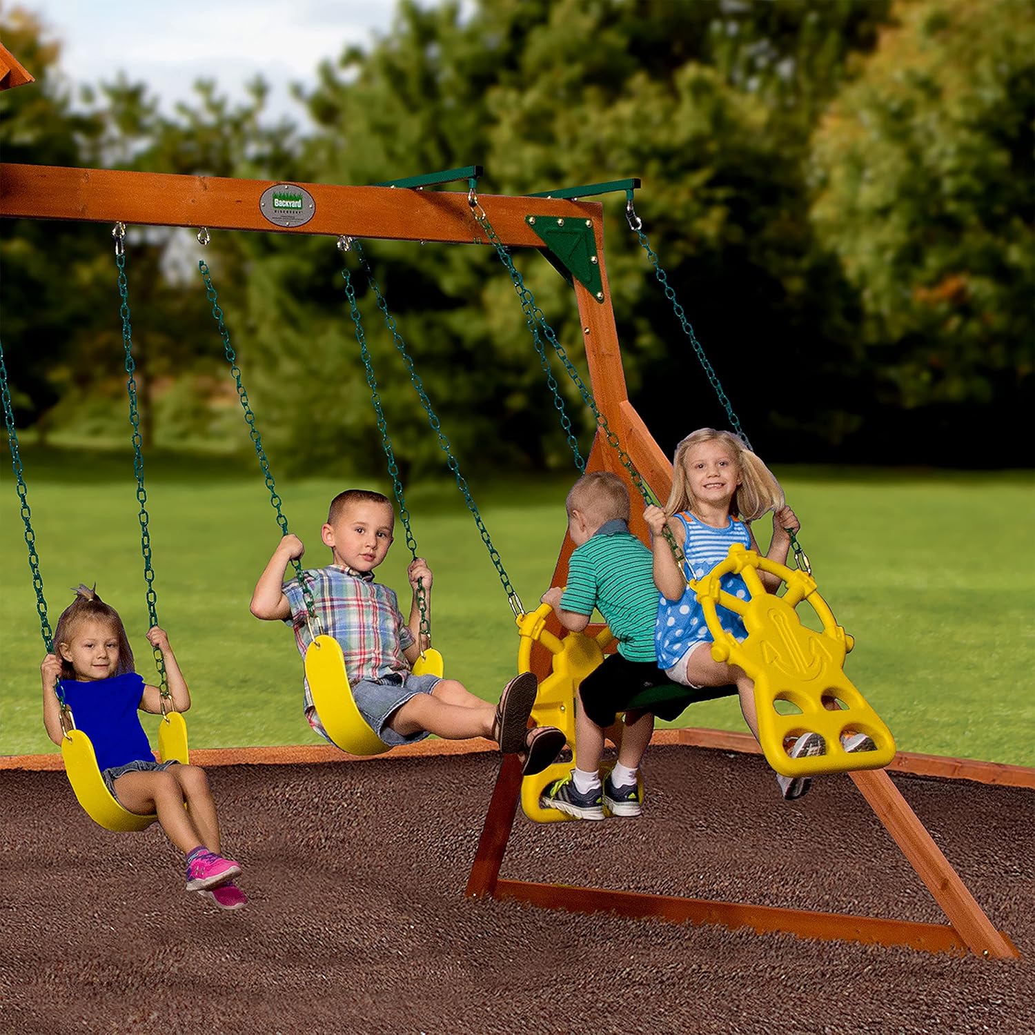 Wood playhouse swing set with green slide and two hanging swings