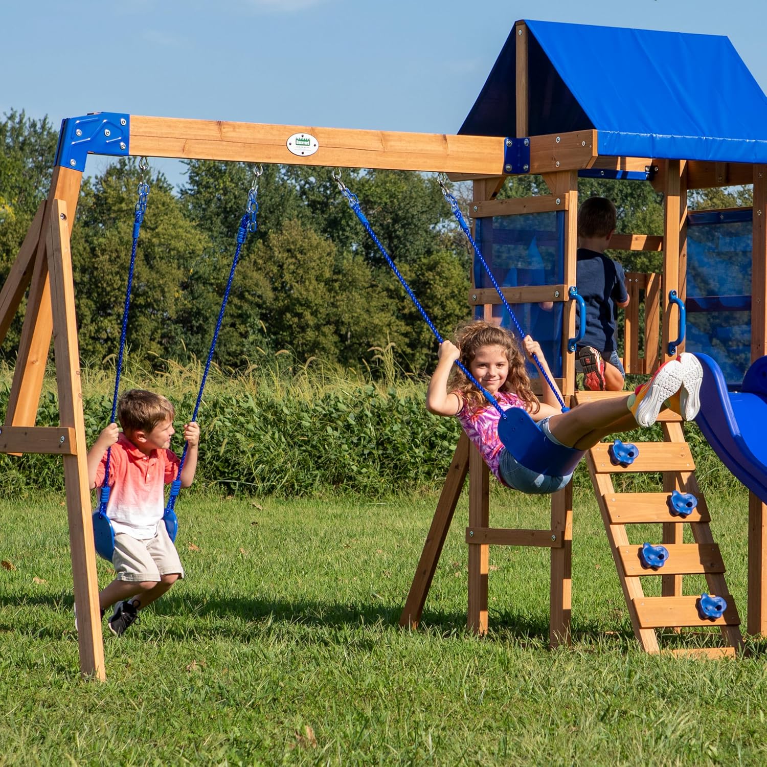 Aurora play centre swing set with slide, cedar frame and blue canopy