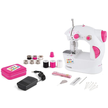 Toy sewing machine playset with accessories, pink and white body, foot pedal and spools.