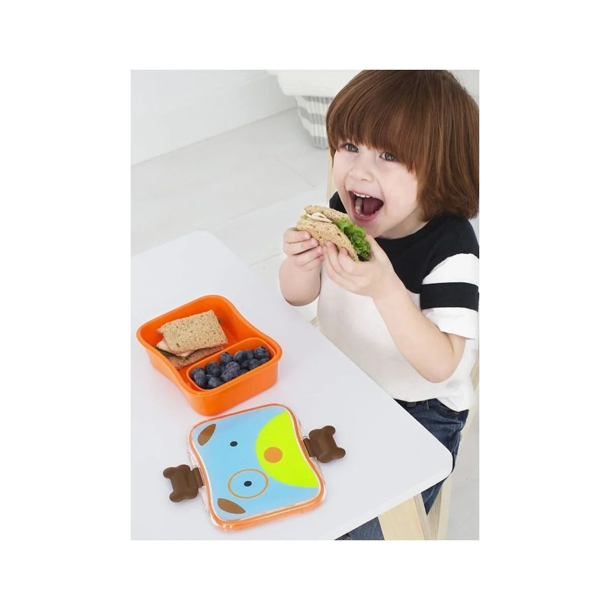 Unicorn-themed lunch kit with orange divider container and snack box