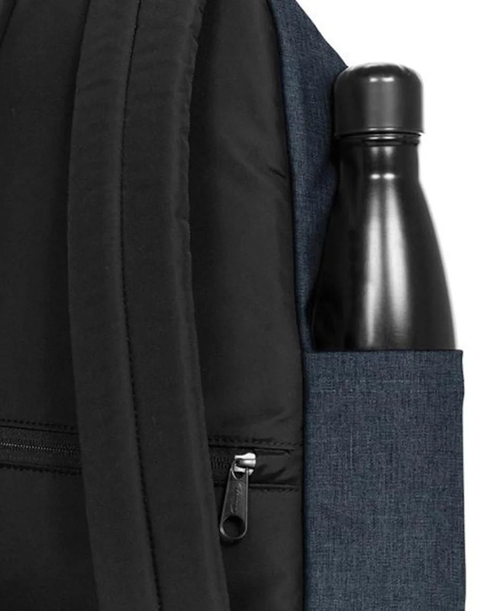 Denim backpack with side bottle pocket, zipper pull, and black adjustable strap