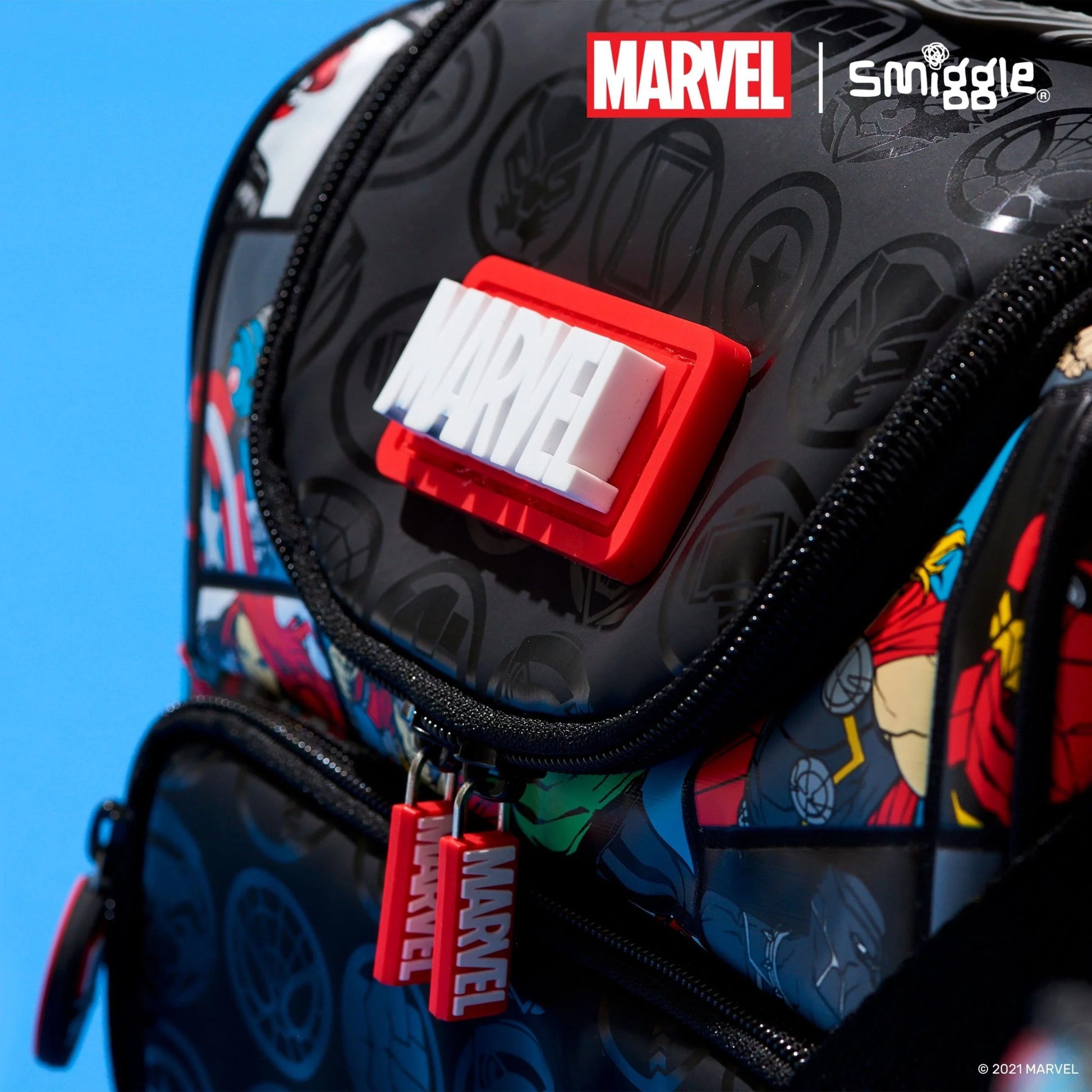 Black Marvel lunch bag front zipper pocket with red MARVEL label and patterned lining.