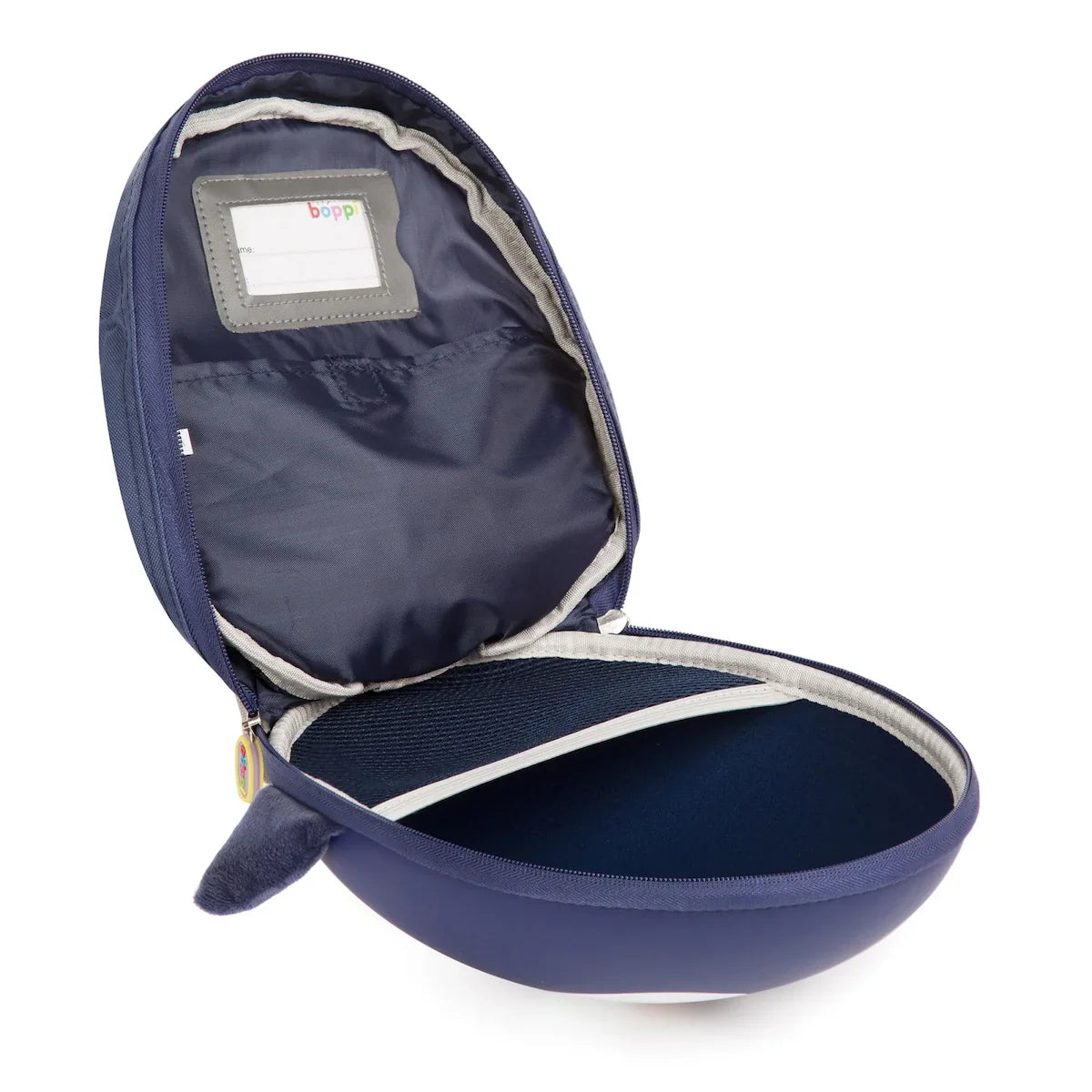 Navy mini backpack open to reveal padded interior and storage label patch.