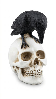 Skull accessory with black ravens on top and exposed bone face detail